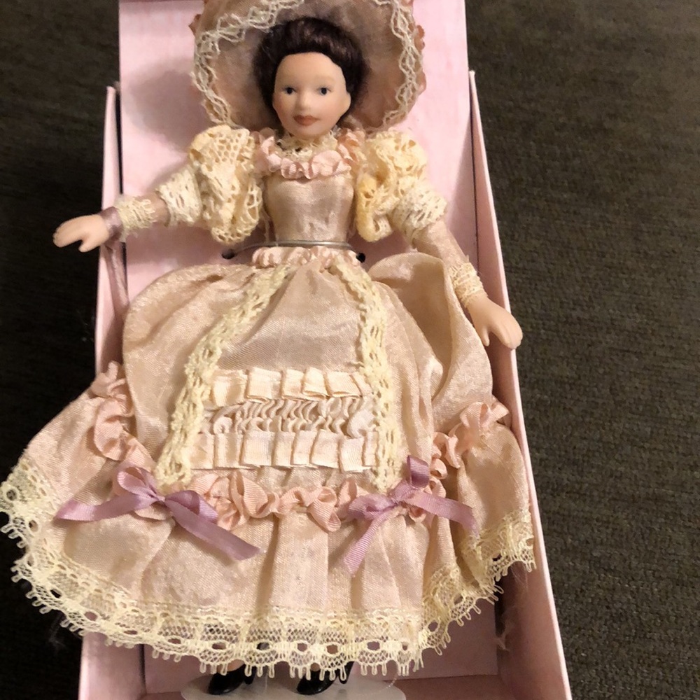 Miniature Victorian Porcelain doll new in box.